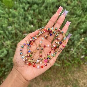 Small multicolored beaded African anklets from Ghana